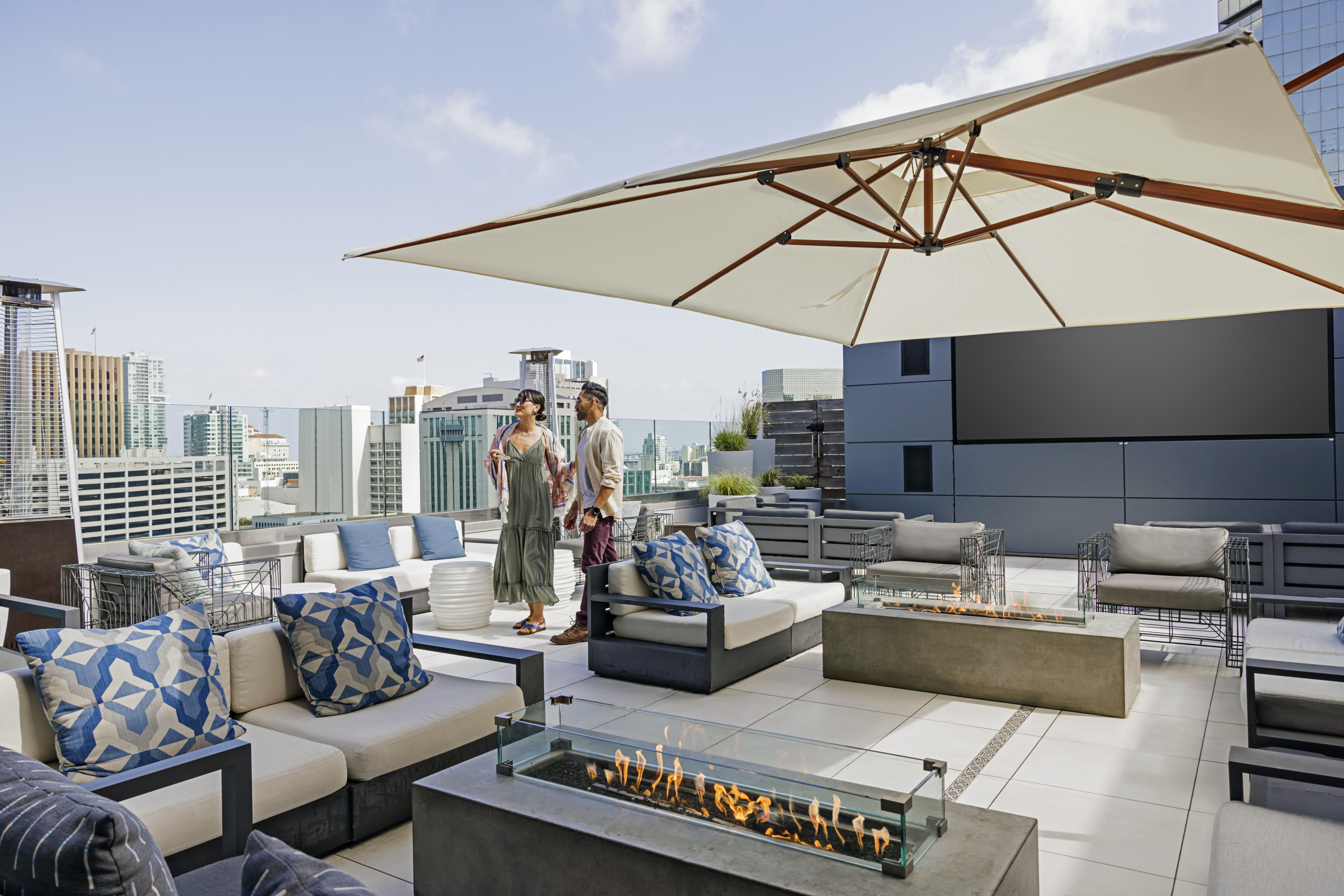 Man and woman on rooftop patio
