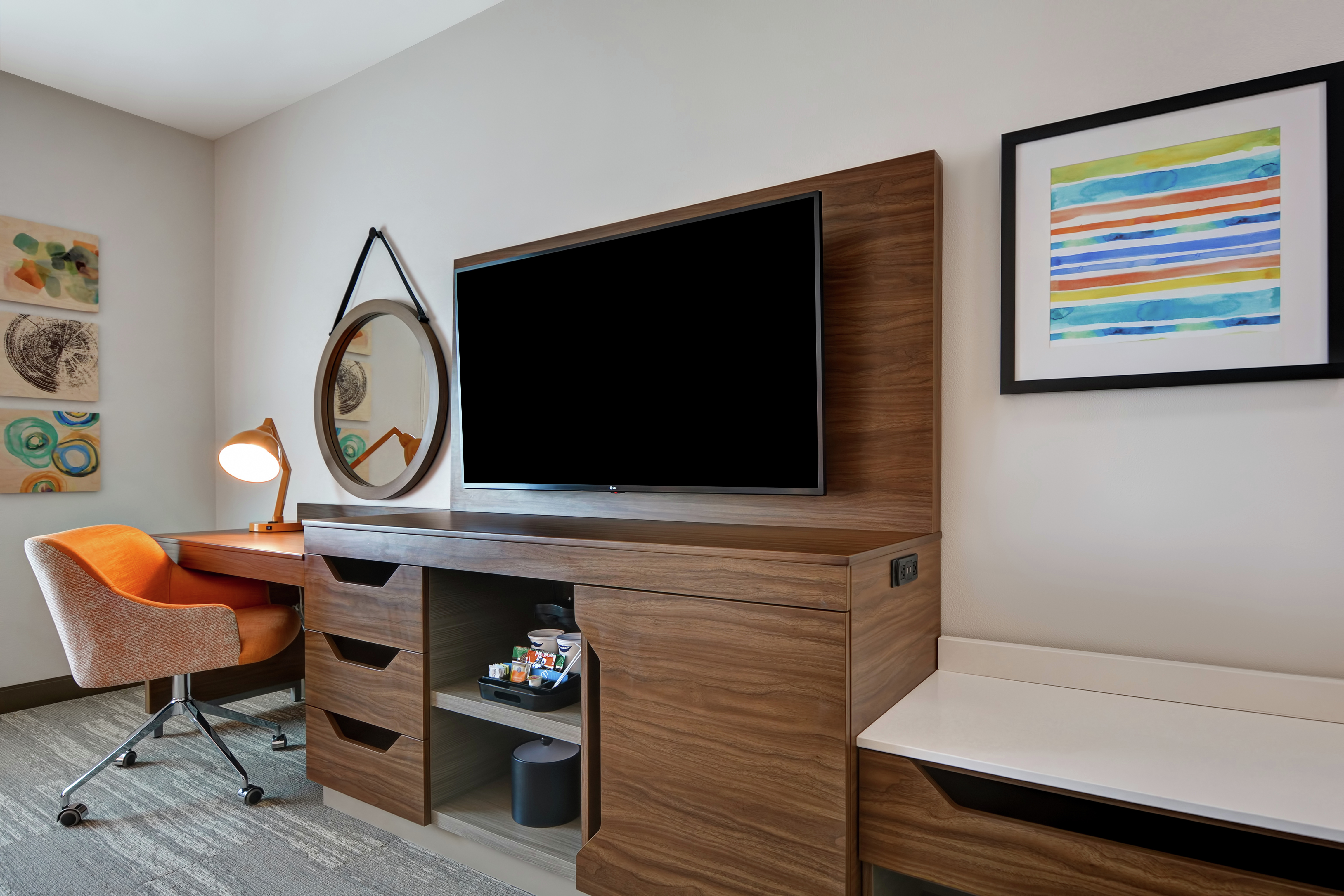 Guestroom With Work Desk And TV