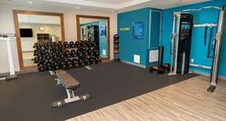 Fitness center with bench and weights