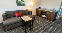 Comfortable seating in room, with wetbar