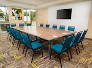 Meeting room with TV and table