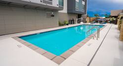 Outdoor pool with handrail