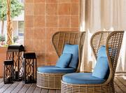 Outdoor seating area with wicker chairs