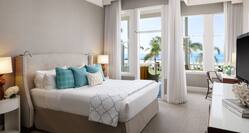 Guestroom with King Bed, Work Desk, Television and Ocean View