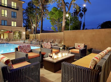 Poolside Firepit and Seating at Night