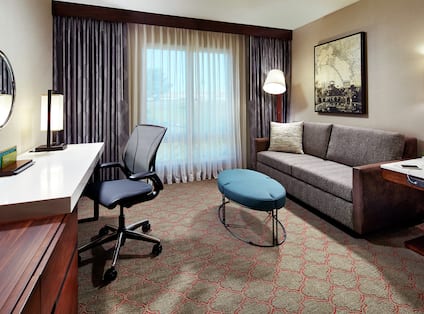 King Sofa, Desk and Window in Hotel Suite