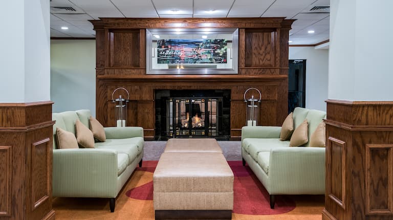 Lobby Seating Area with Fireplace and Couches