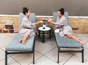 Two Women on Spa Loungers