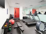 Fitness center with treadmills recumbent bikes and weights