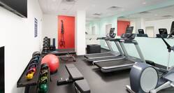 Fitness center with treadmills recumbent bikes and weights