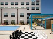 Exterior patio area with large chess game