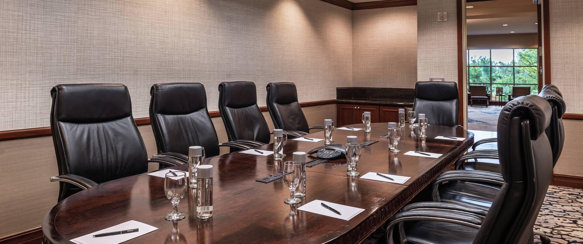 Boardroom Table with Leather Chairs in Meeting Room
