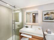 Bathroom with sink and shower view