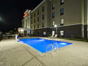 Hotel Outdoor Pool Area at Night