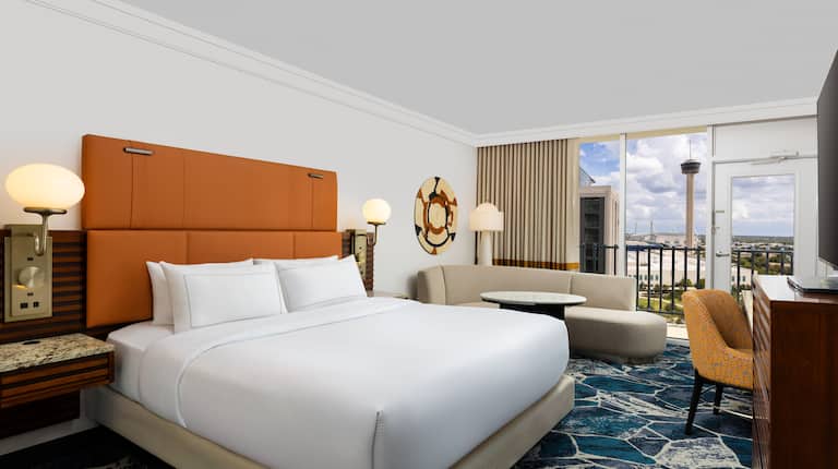 Guest Room with a Lounge Area and Work Desk