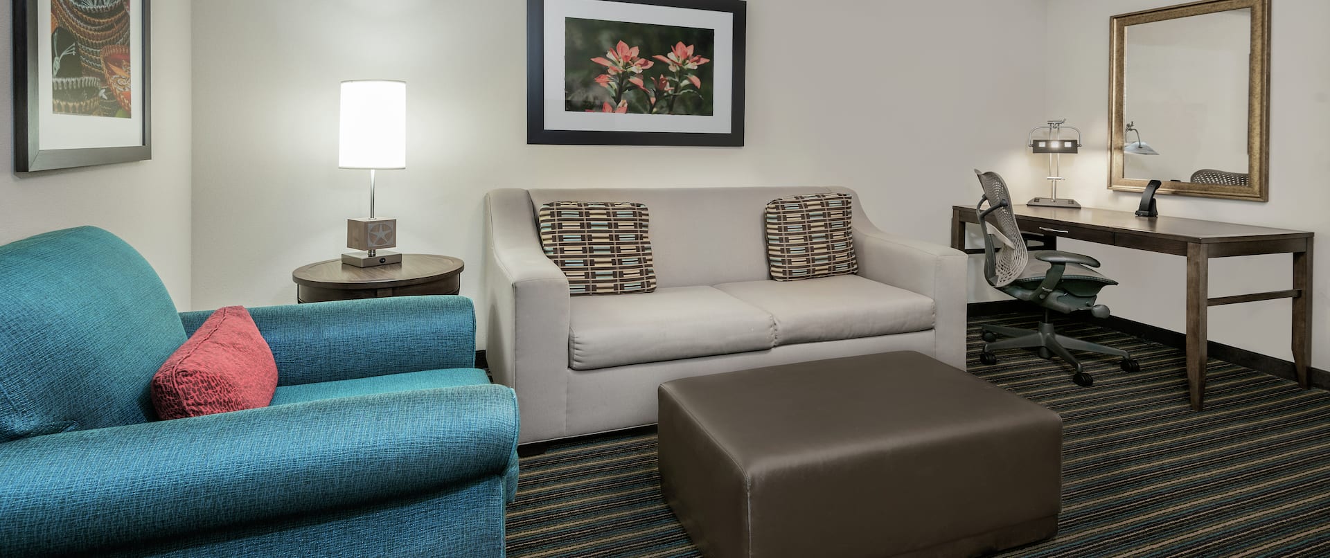 Guest Suite Lounge Area with Sofa and Work Desk