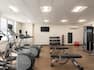 Spacious on-site fitness centre featuring ample equipment options