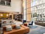 Bright hotel lobby with floor to ceiling windows for ample natural light