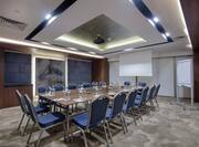 Meeting room with large table and chairs