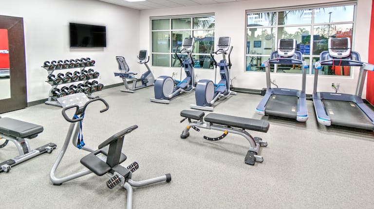 Fitness Center with Treadmills Bikes and Weights