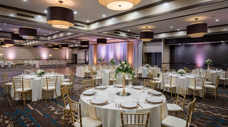 Ballroom with round tables and chairs