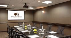 Boardroom Meeting Room with Table, Office Chairs and Projector Screen