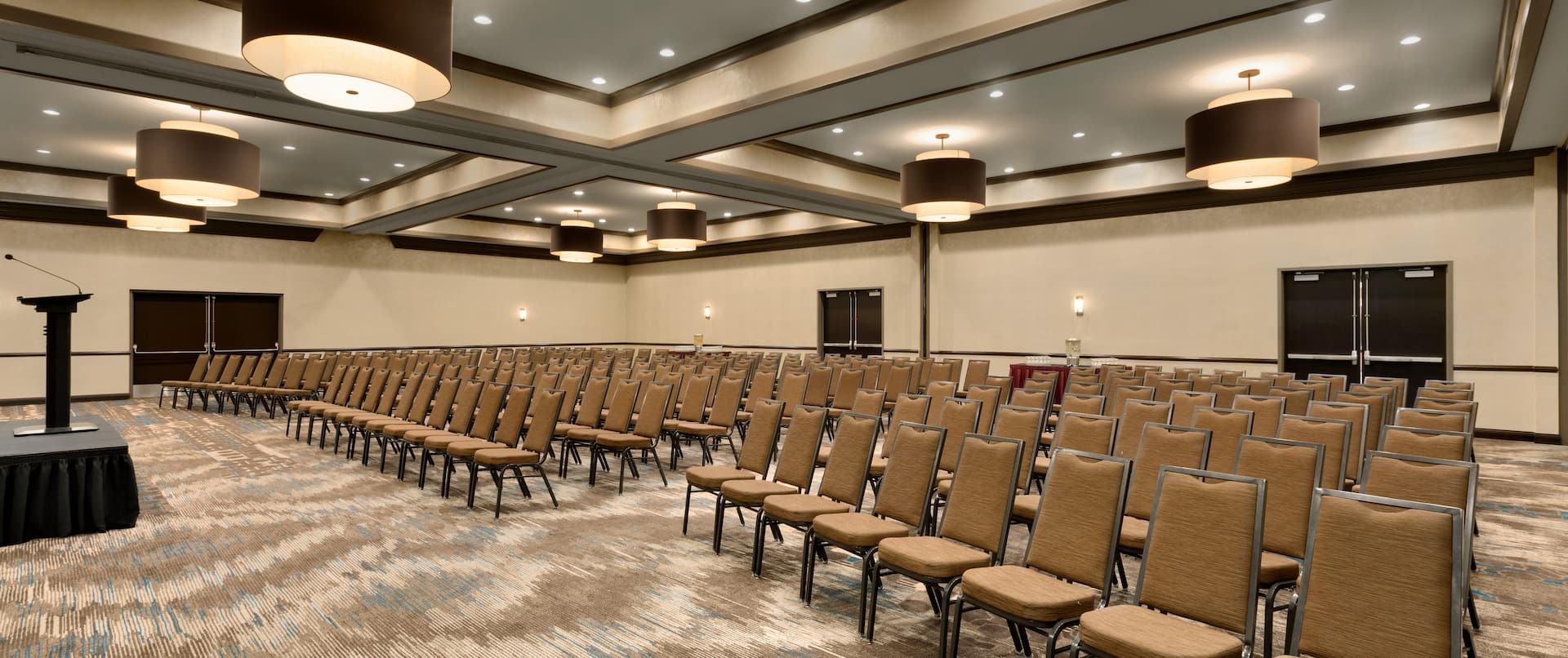 Ballroom Theater Setup with Rows of Chairs