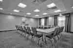 Meeting Room With U-Shaped Table and Chairs