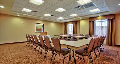 Meeting Room With U-Shaped Table and Chairs