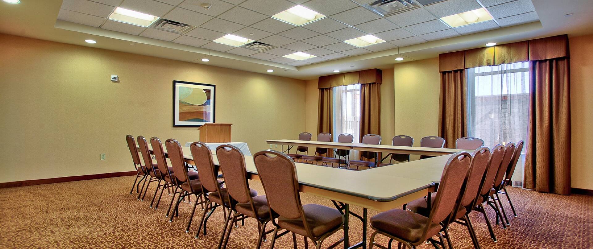 Meeting Room With U-Shaped Table and Chairs