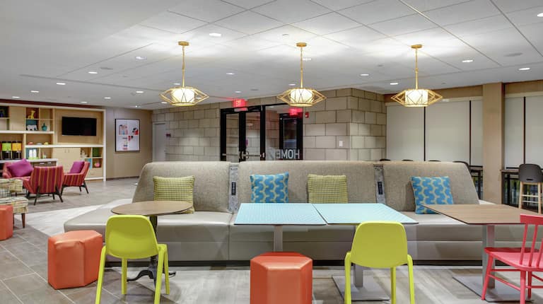 Spacious modern lobby with netural decor spiced with bright accent colours