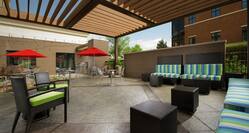 Outdoor Patio and Lounge Area with Overhanging Pergola 