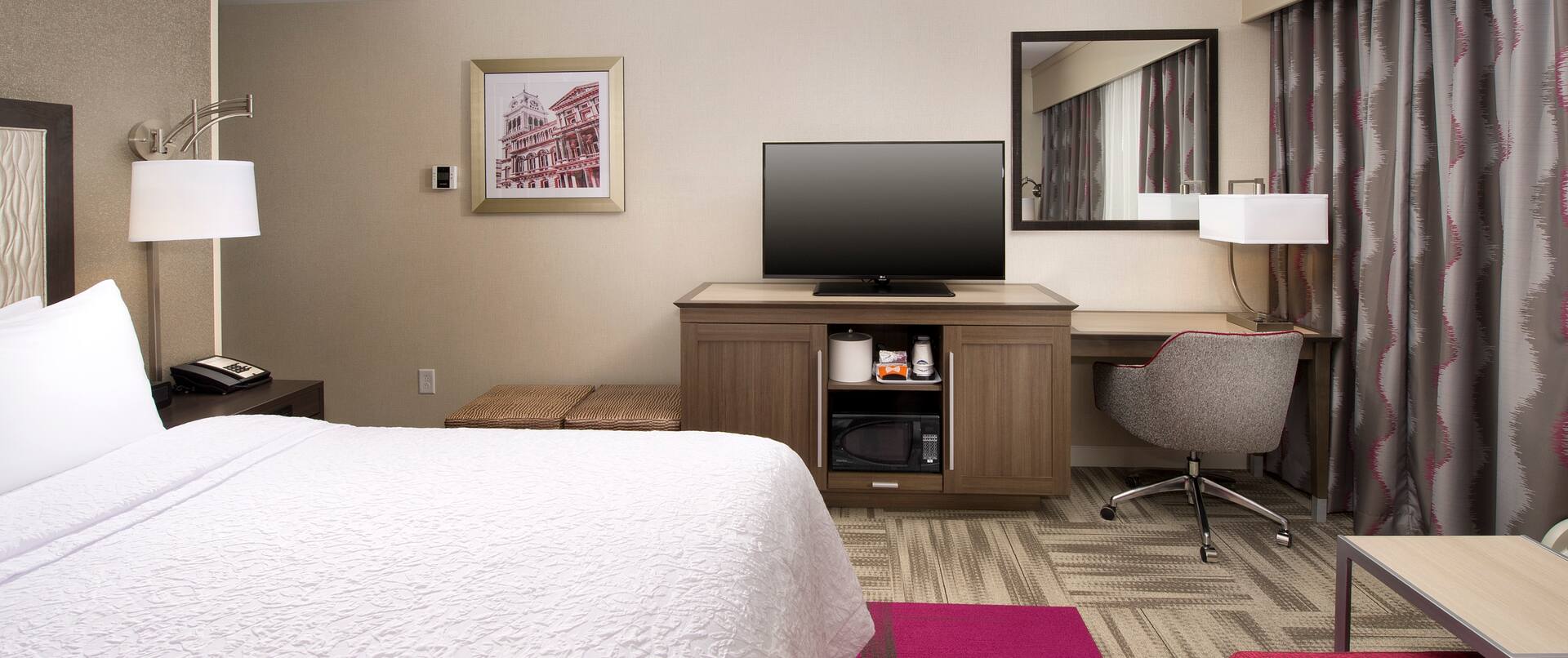 King Guest Room with TV and Desk