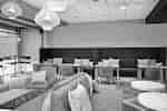 Lobby Seating Area with Chairs, Tables and Sofas