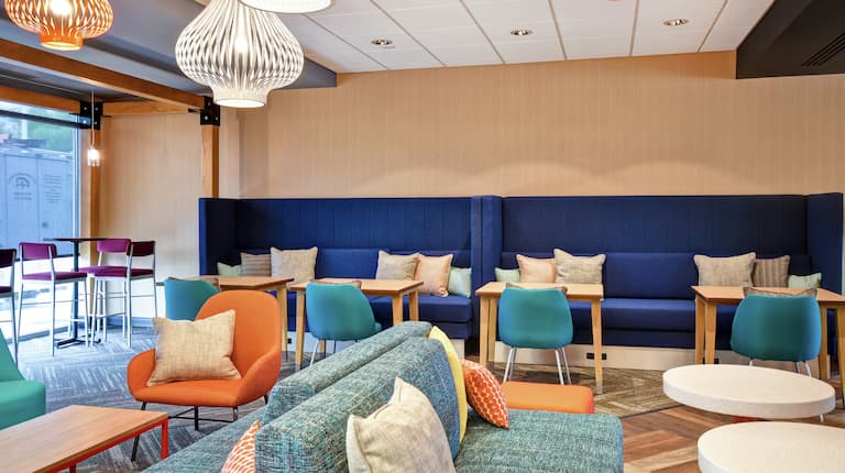 Lobby Seating Area with Chairs, Tables and Sofas