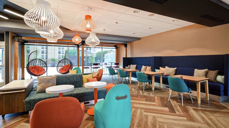 Lobby Seating Area with Chairs, Tables and Sofas