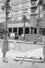 GIrls Playing Tic Tac Toe Game in Outdoor Pool Area