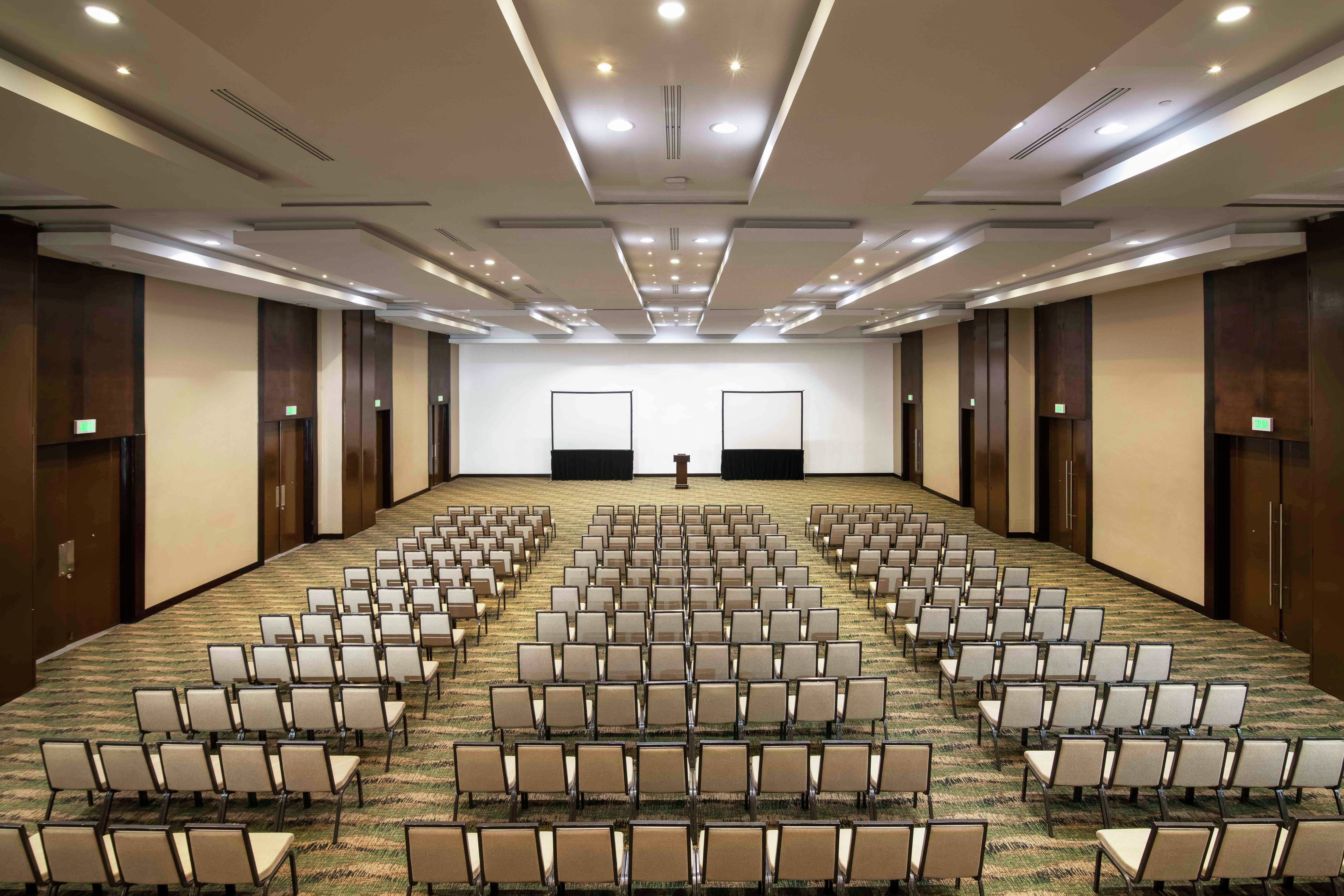 Large Meeting Room with Rows of Chairs