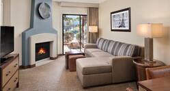 Guest Suite Living Room with Sofa, Footrest, Outside Area, Fireplace and HDTV
