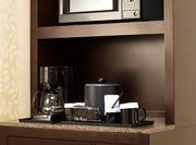 Hospitality Center Cabinet With a Microwave, Coffee Maker and Refrigerator