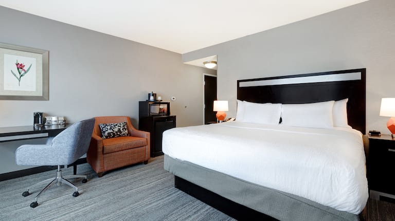 guest room with bed and work desk