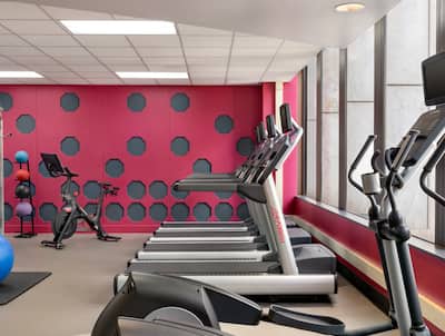 Treadmills and Exercise Balls in Fitness Room
