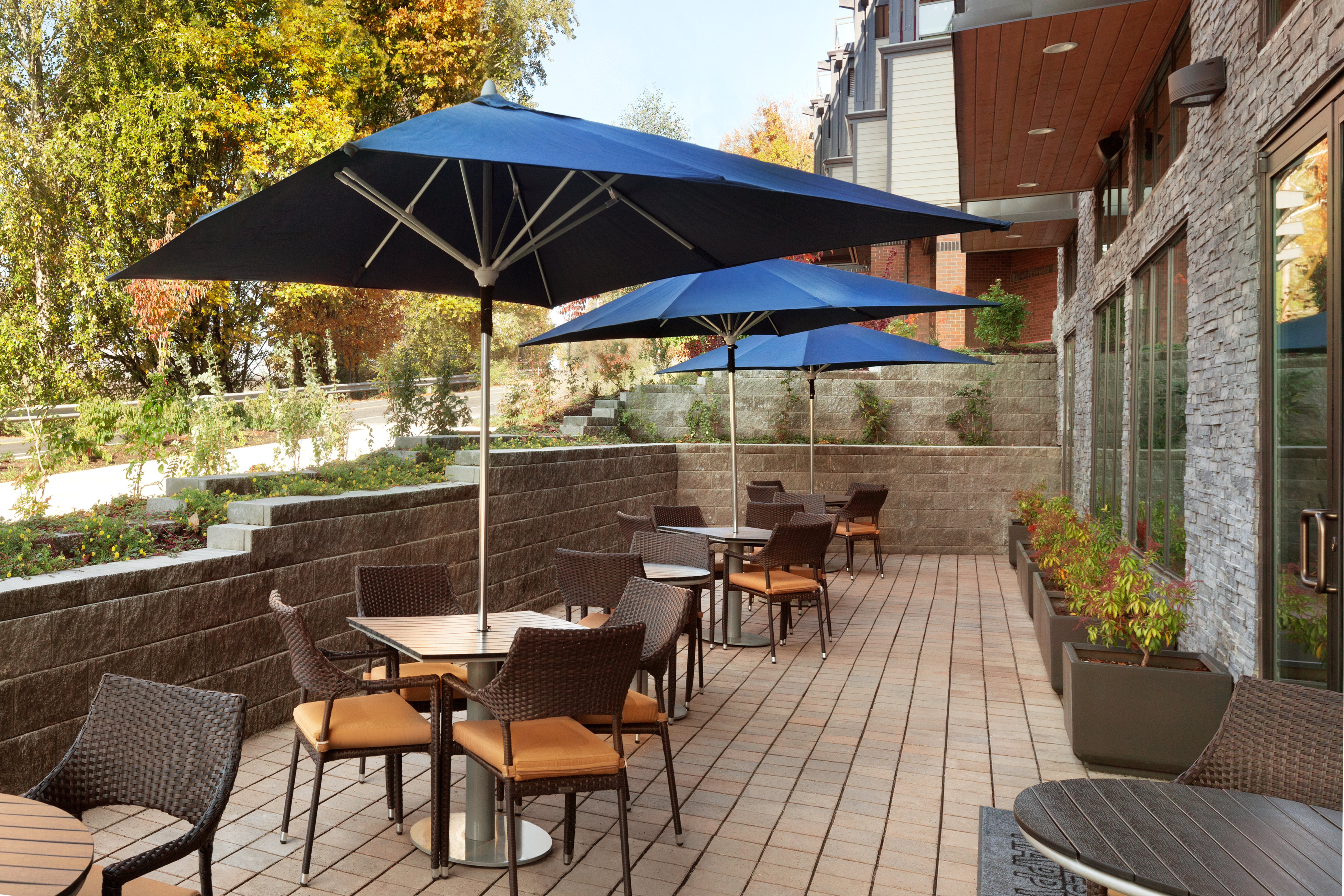 Breakfast Outdoor Patio with Chairs, Tables and Umbrellas