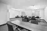 meeting room with tables and chairs