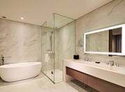 king premium suite bathroom with shower and tub