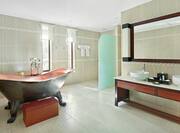 Dual Vanity and Bathtub in Guest Room 