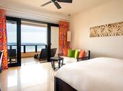 Bed in Guest Room with Ocean View