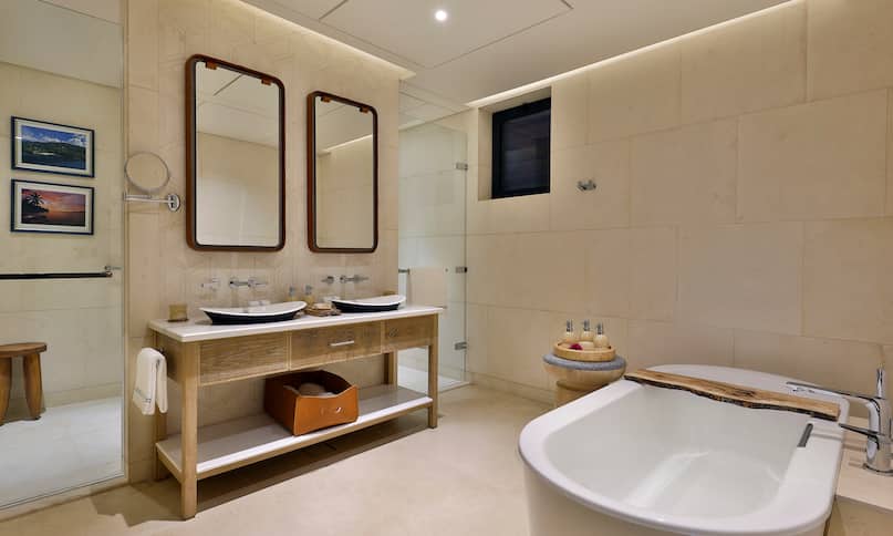 One bedroom suite bathroom with tub and shower-previous-transition