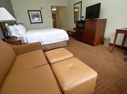 One King Bed Guest Suite with Sofa, Two Footrests, Work Desk and TV