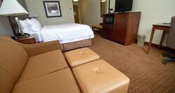 One King Bed Guest Suite with Sofa, Two Footrests, Work Desk and TV